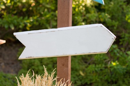 White wood arrow sign.の写真素材