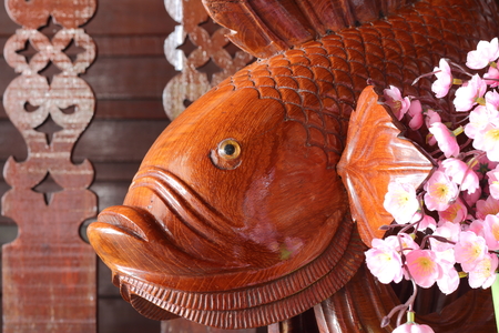wood fish carveの写真素材