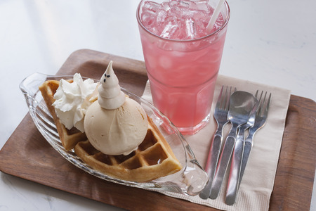 waffles with ice cream and soft drink
