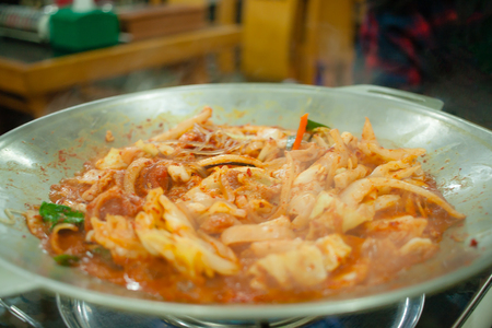 Korean stir-fried pork and squid with spicy sauce (Osam Bulgogi)の写真素材