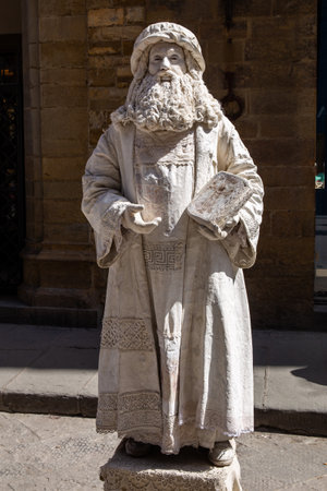 Florence, Italy - April 08, 2018: A living statue of Leonardo da Vinci on street in Florenceのeditorial素材