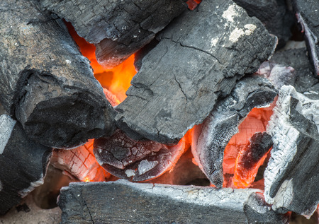 Burning charcoal grill
