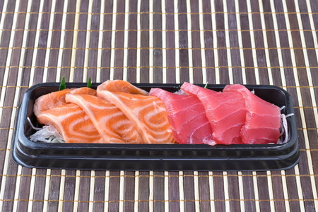 Raw salmon and raw tuna sashimi slice  in Japanese food style, selective focus.の写真素材