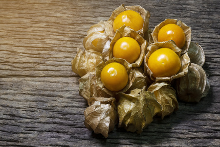 Cape Gooseberry on wooden background, Physalis fruit , selective focus.の写真素材