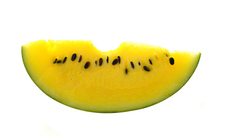 A piece of yellow watermelonの写真素材