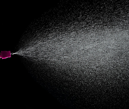 close up of a spray drops on black backgroundの写真素材