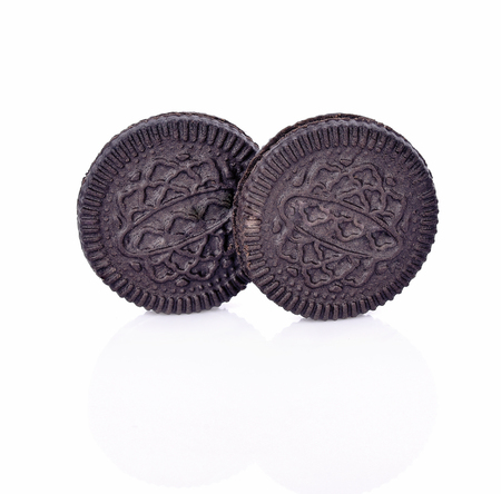 sandwich cookies with cream on white backgroundの写真素材
