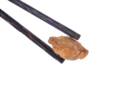 Curry Puff pastry and chopsticks White backgroundの写真素材