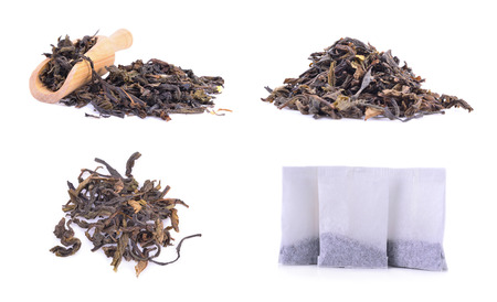 Heap of dried green tea on white backgroundの写真素材