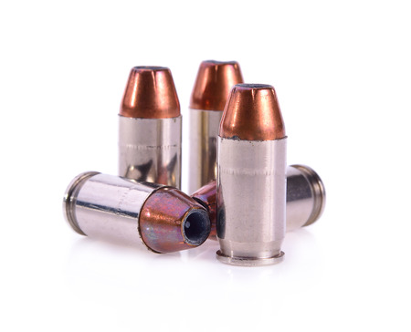 9mm bullet for a gun isolated on white background.の写真素材