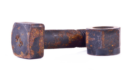 Old rusty screw isolated on a white backgroundの写真素材