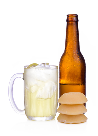 Palm juice of glass with ice and coconut sugar isolated on white background.の写真素材