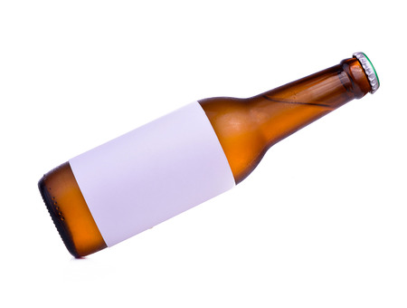 Bottle of beer with drops isolated on white backgroundの写真素材