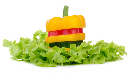pepper sweet red, green,yellow and lettuce isolated on a white background.の写真素材