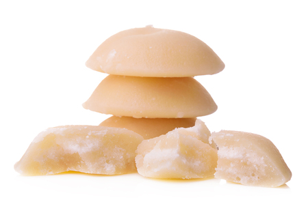 sliced palm sugar isolated on white background.の写真素材