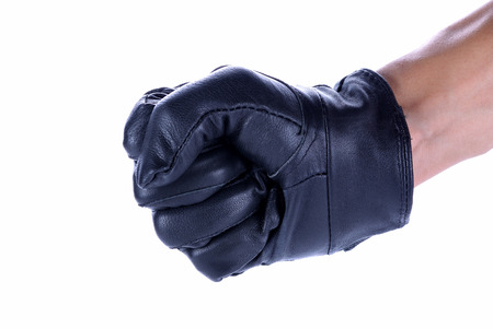 A human hand in black leather glove making a shooting gesturing, isolated on white backgroundの写真素材