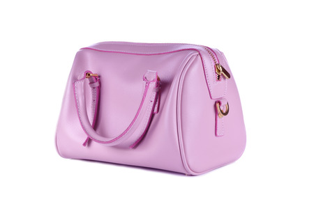 pink glossy female leather bag isolated on white backgroundの写真素材