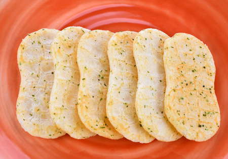 Japanese rice crackers with seaweed flavor on the plate