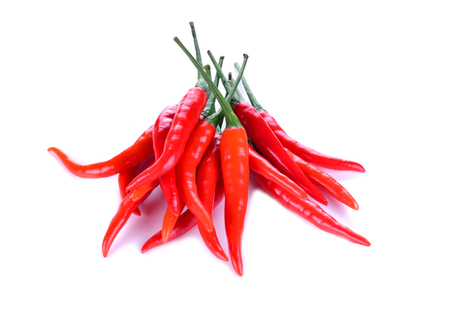 Group of red chili peppers isolated on white background for food decorationの写真素材