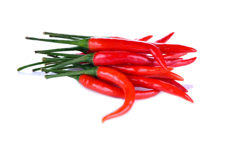 Group of red chili peppers isolated on white background for food decorationの写真素材