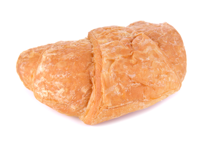 Fresh and tasty croissant over white backgroundの写真素材