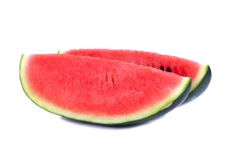 Sliced ripe watermelon isolated on white backgroundの写真素材