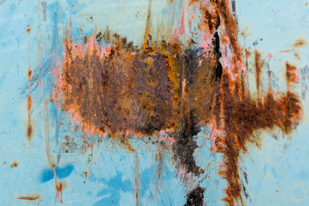 Corroded  bluemetal background. Rusted white painted metal wall. Rusty metal background with streaks...