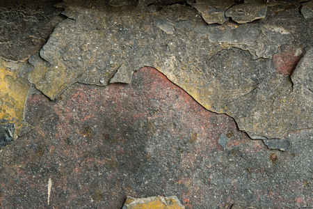 A background of peeling paint and rusty old metal