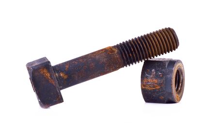 Old rusty screw isolated on a white backgroundの写真素材