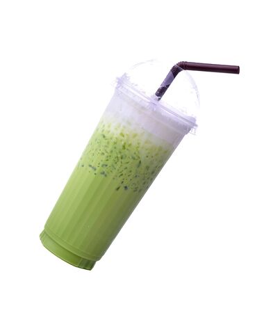 green tea cold matcha  in a glass isolated white backgroundの写真素材