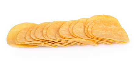 crispy potato chips isolated on white backgroundの写真素材