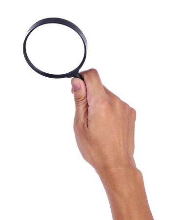 Man's hand with magnifying glass.の写真素材