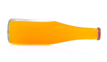 Orange juice glass bottle. Isolated on white backgroundの写真素材