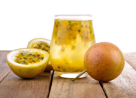 Passion fruit and passion fruit juice isolated on white background.の写真素材
