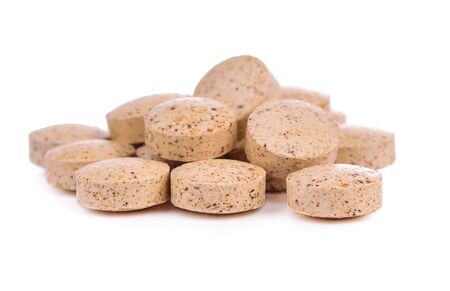 Pills of vitamin C isolated on white background.の写真素材