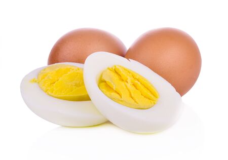 two halves of a boiled egg on white backgroundの写真素材