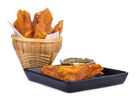 Deep fried dumplings on white backgroundの写真素材