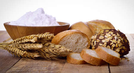 assorted breads isolated on a white background.の写真素材