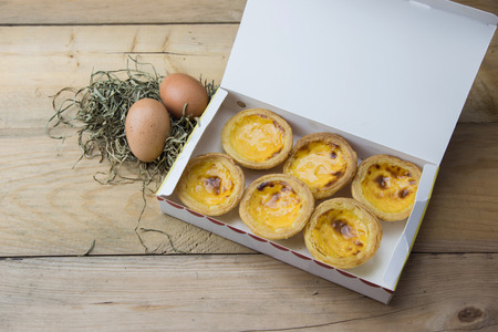 delicious portuguese egg tart on white box