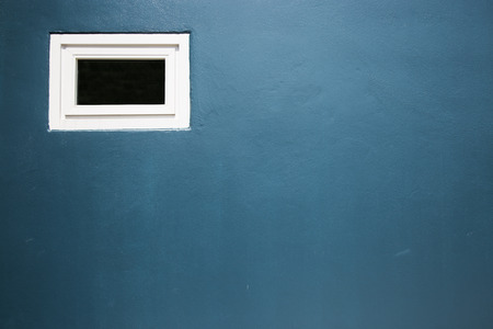 window and blue wallの写真素材