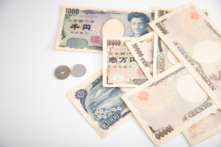 Japanese yen banknotes and Japanese yen coin
