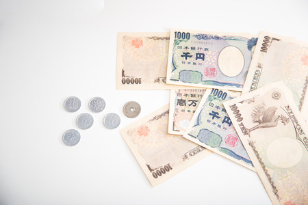 Japanese yen banknotes and Japanese yen coinの写真素材