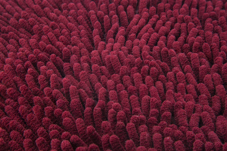 Red not cleaning doormat or carpet textureの写真素材