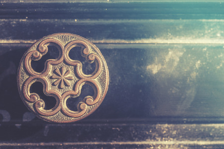 Old drawer handle. Cross processed image for vintage lookの写真素材