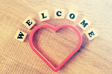 Welcome message. Cross processed image for vintage lookの写真素材