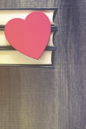 Love to read concept. Selective focus image cross processed for vintage lookの写真素材