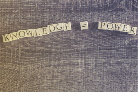 Knowledge equals power quote. Cross processed image for vintage feelingの写真素材