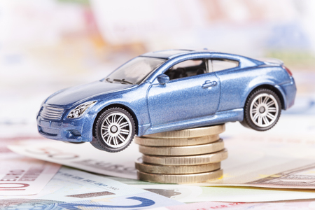 Car and money concept. Selective focus image with shallow depth of fieldの写真素材