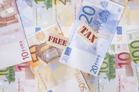 Financial concept with Tax Free signs on euro banknotes. (Selective focus image)の写真素材