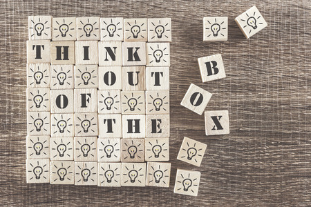 Think out of the box concept with wooden cubesの写真素材